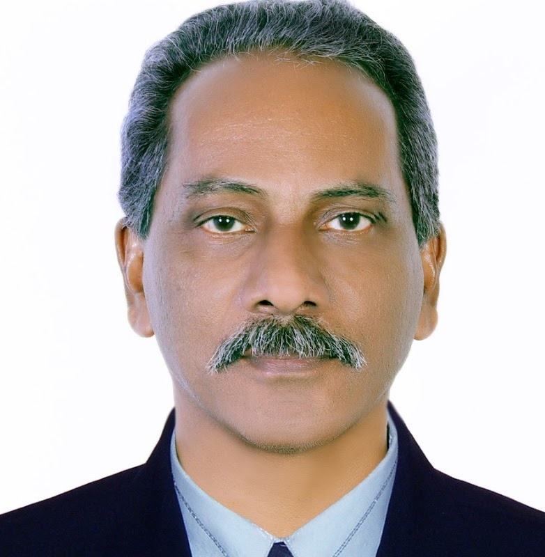 Dr. T D John